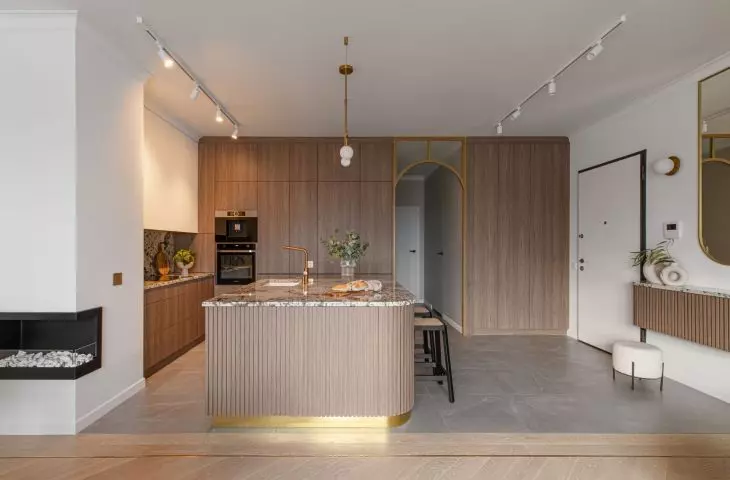 The kitchen is color-matched to the rest of the room 