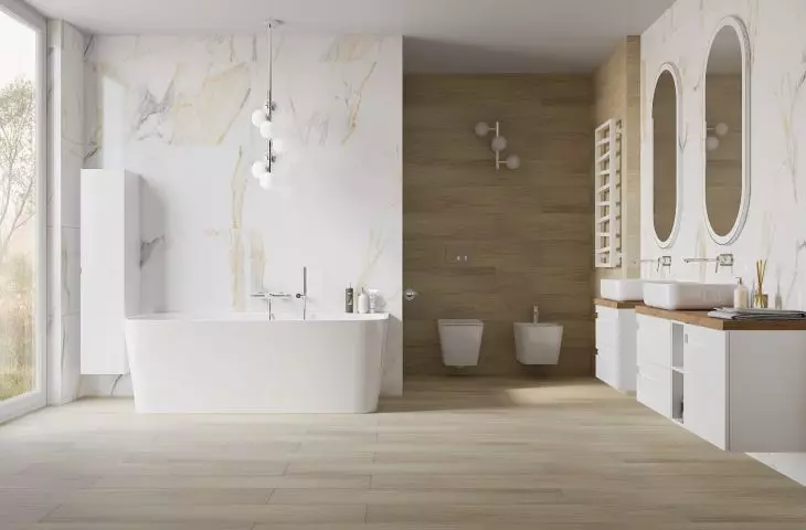 Wanna wolnostojąca Mensola 1700 / Słupek Floryda 300 / Szafka Floryda 600 z koszem cargo Floryda i modułem 200 / Blat Oak 1300 / Umywalka nablatowa Galera slim / Lustro Kalisto 1200x600 / Miska wisząca i bidet Onil oraz grzejnik Frio White 1096x500