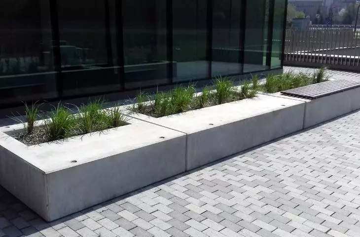 Prefabricated architectural concrete flower pots and benches