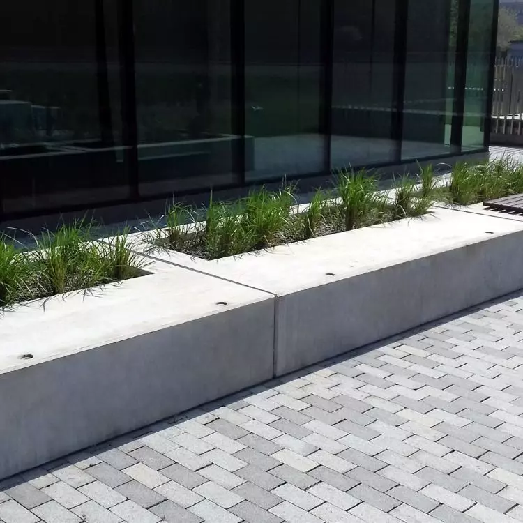 Prefabricated architectural concrete flower pots and benches
