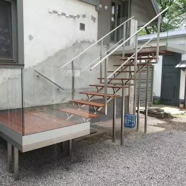 Stainless steel staircase with bangkirai wood according to customer's idea