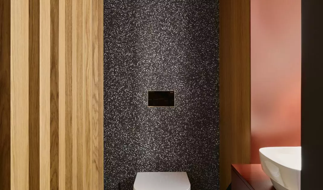 Maroon accents in the bathroom
