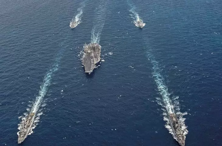 A strike aircraft carrier never sails alone; with cover and support ships, the team's population often exceeds 10,000 residents 