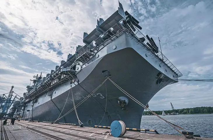 The USS Kearsarge moored in the harbor as seen from the front