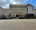 Wolności Square, Poznań, south frontage. In the middle, the former PKO BP bank, a 1937 building.