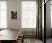 in the conference room there were placed curtains with good noise absorbing qualities