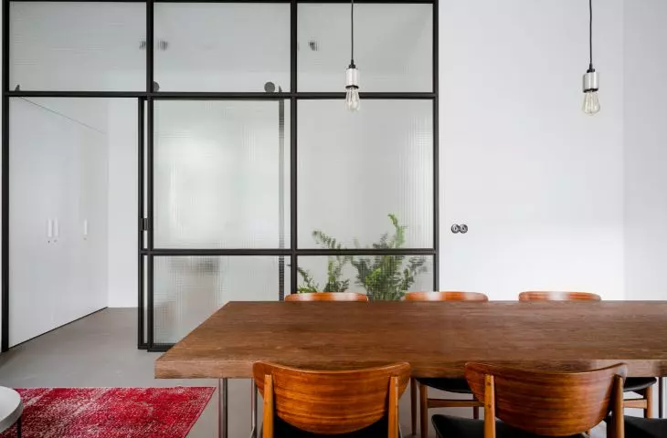 the interior combines industrial and vintage elements