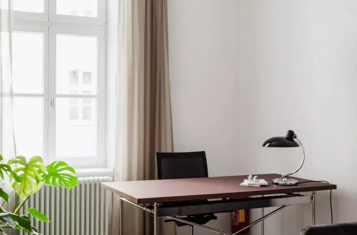 home atmosphere is created by curtains and carpets
