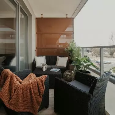The balcony serves as a summer living room