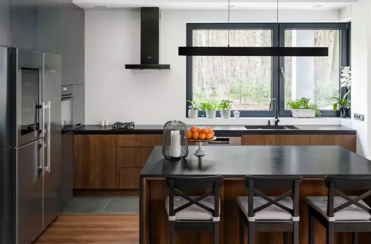 Kitchen with dark island