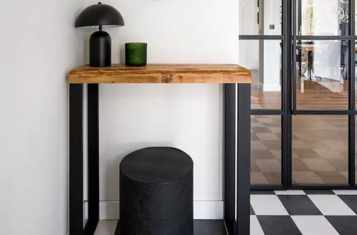 White and black checkerboard on the floor and glass doors with black muntins