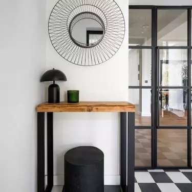 White and black checkerboard on the floor and glass doors with black muntins