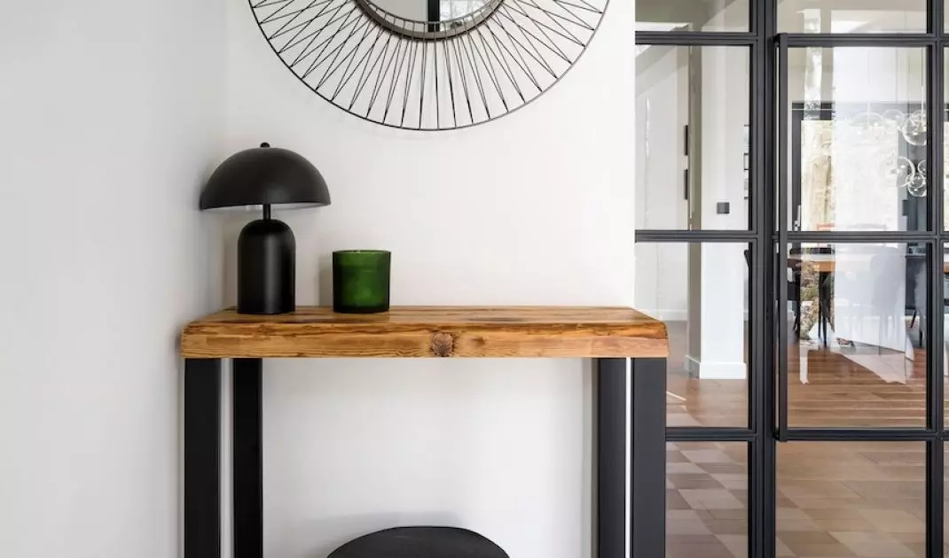 White and black checkerboard on the floor and glass doors with black muntins