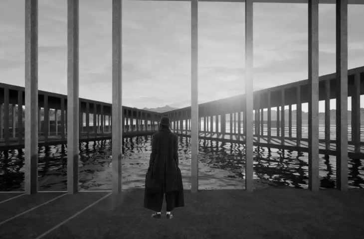 Tall and narrow windows correspond with the openwork walls of the corridors that run around the sheet of water