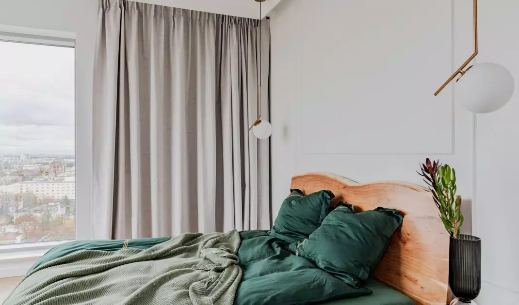 The bedroom has electrically operated curtains
