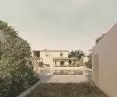 The center features a courtyard with a swimming pool