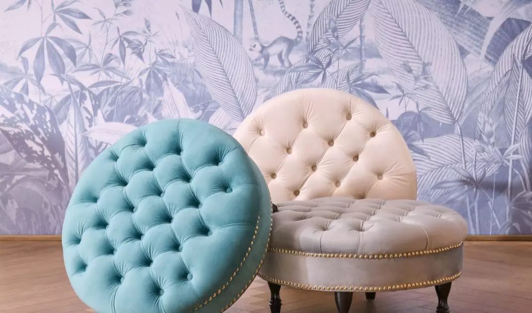 Upholstered poufs are one of the hallmarks of this style