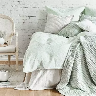 Cozy textiles will complement the arrangement