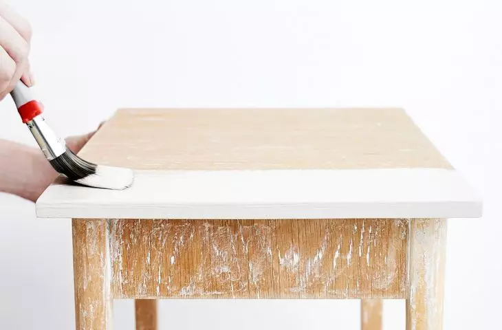 Paint the furniture with two coats of enamel