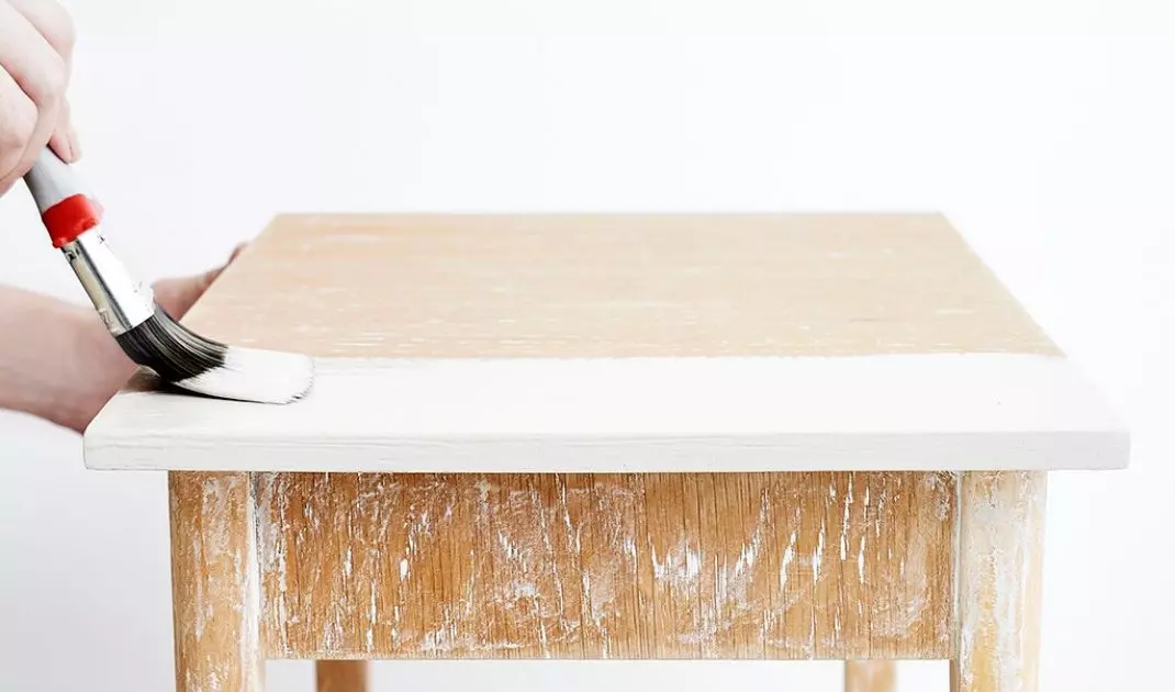 Paint the furniture with two coats of enamel