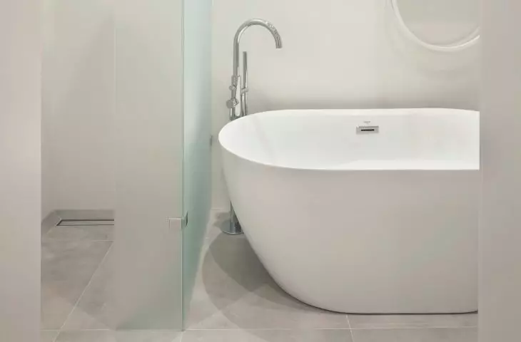 The bathroom is kept in white