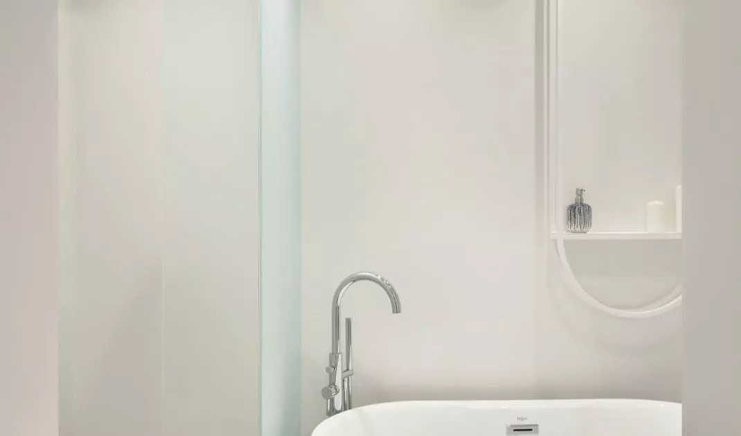 The bathroom is kept in white