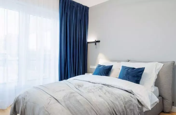 Bedroom with upholstered bed