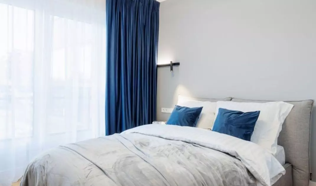 Bedroom with upholstered bed