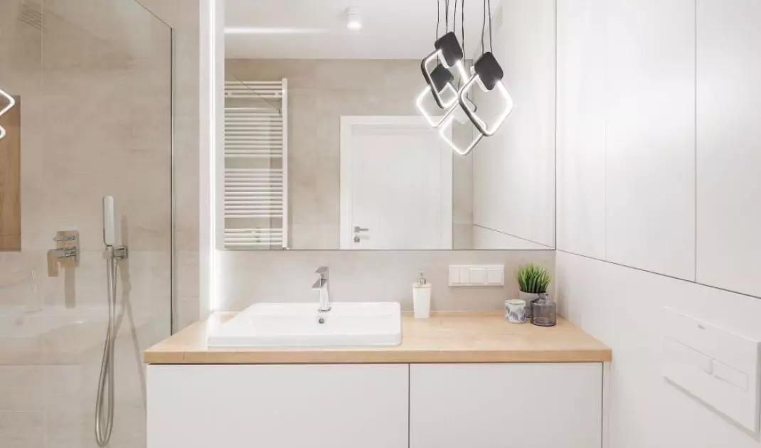 Bathroom combines gray and wood