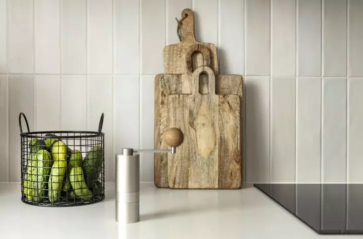 The kitchen is kept in black and white