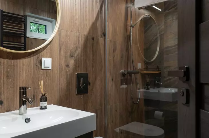 The bathroom was decorated in wood