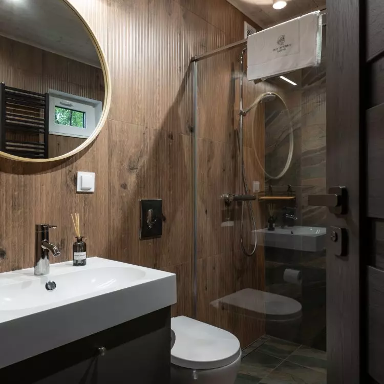 The bathroom was decorated in wood