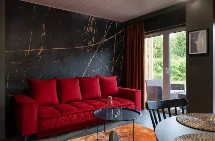 The interior is dominated by shades of red