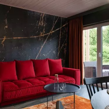 The interior is dominated by shades of red
