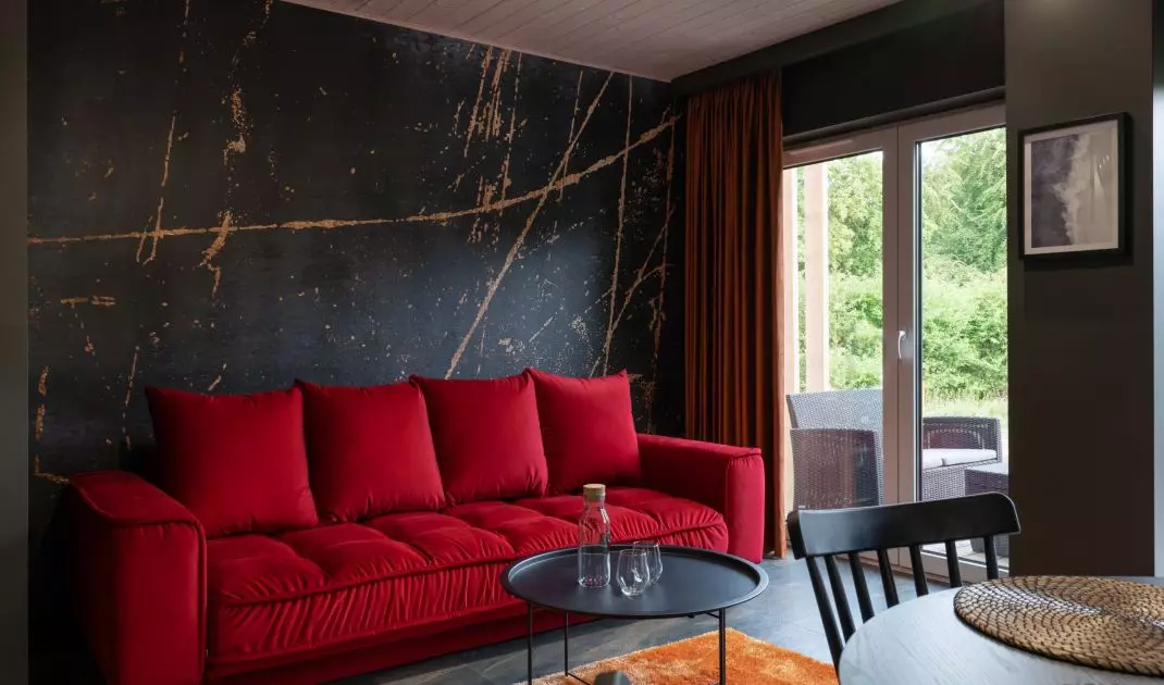 The interior is dominated by shades of red