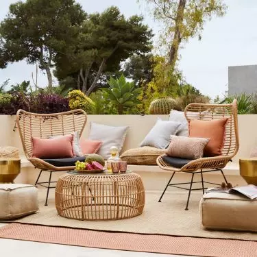 Rattan table suits boho style arrangement