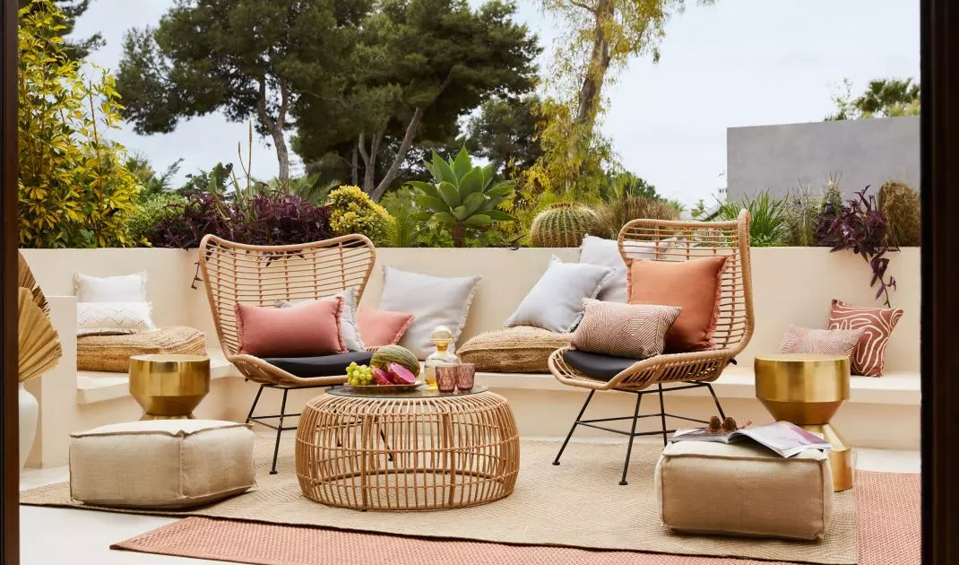 Rattan table suits boho style arrangement
