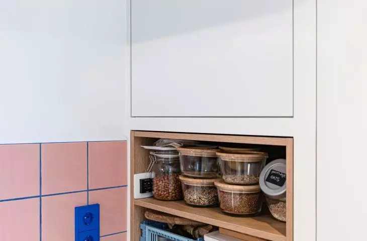 The cabinet in the kitchen was created after moving the toilet wall 
