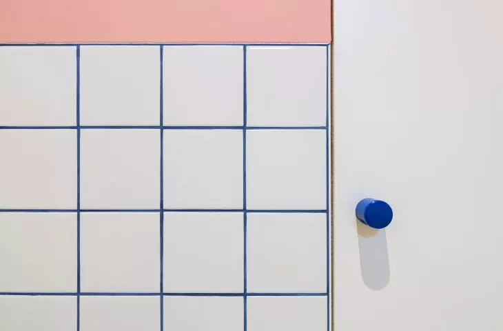 In the kitchen, cobalt-colored grout adds accent