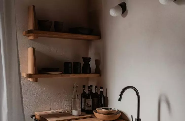 wooden furniture for the kitchen was designed by the architects from the studio Loft Kolasinski