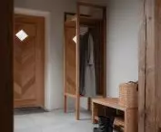 wood is king in the hallway
