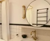 Brass elements in the bathroom were custom-made