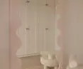 Attention is drawn to the unusual frame of the mirror