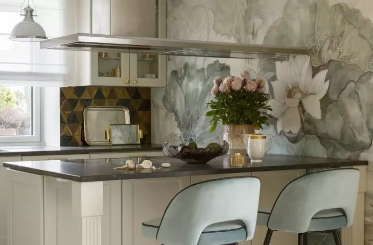 The kitchenette stands out with wallpaper 