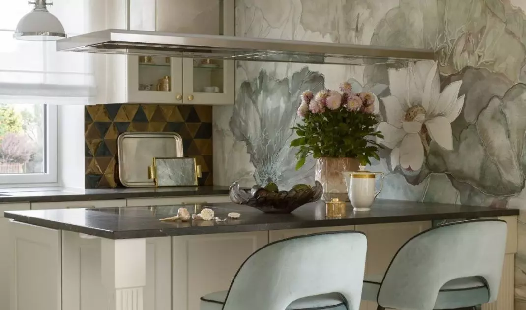 The kitchenette stands out with wallpaper 
