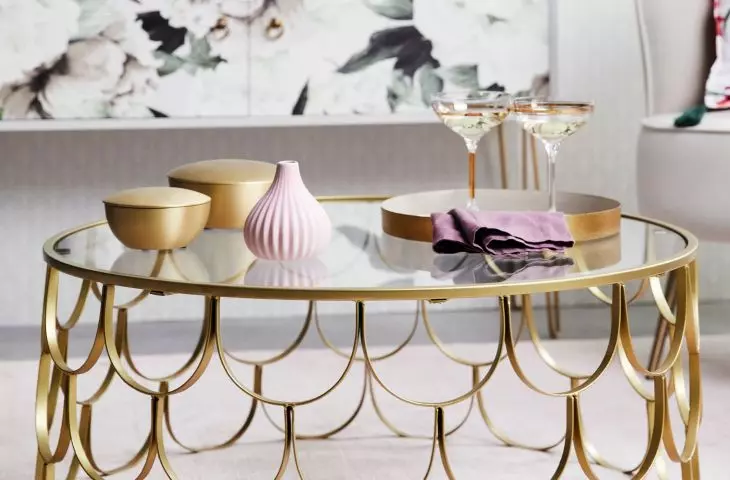 Openwork gold table will work perfectly in the interior in this style
