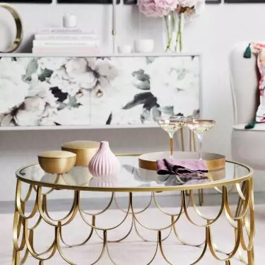 Openwork gold table will work perfectly in the interior in this style