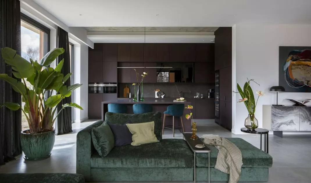 The living area consists of a living room, kitchen and dining room