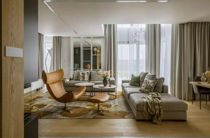 Leaf pattern carpet connects living room and garden