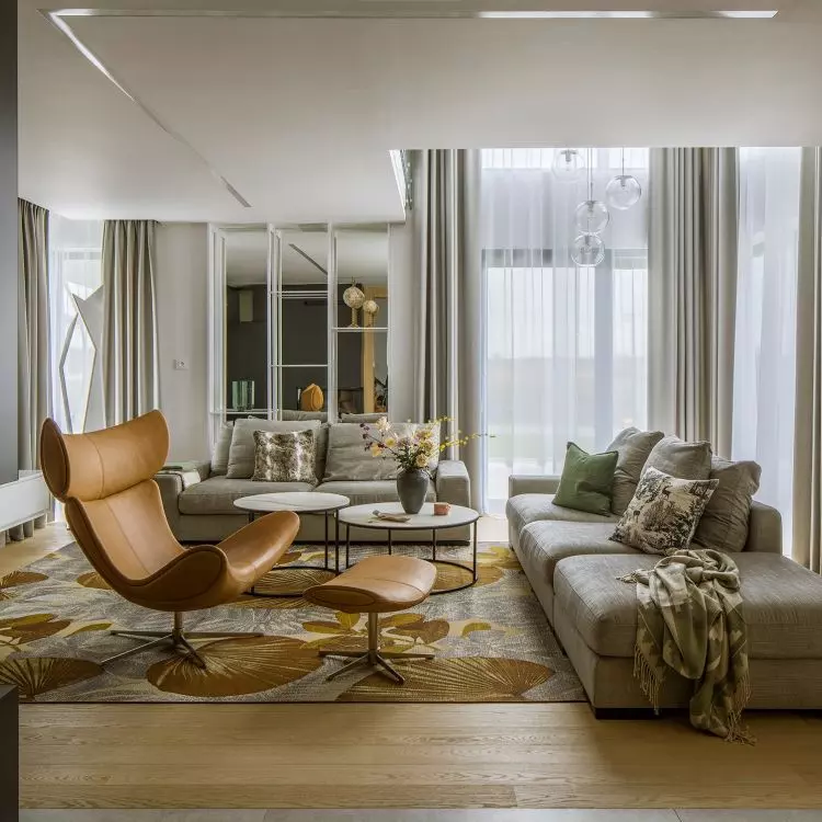 Leaf pattern carpet connects living room and garden